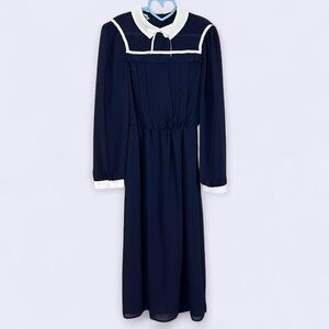 Elegant Navy Blue Dress with White Accents